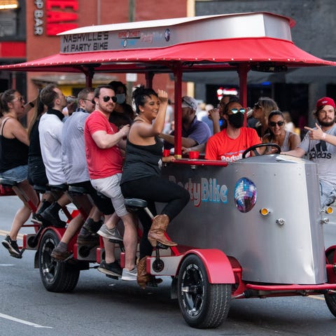 A party bike passes down Lower Broadway in Nashvil