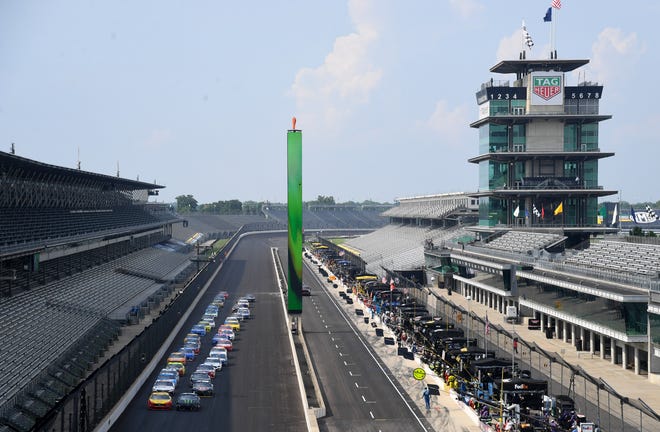 Jul 5, 2020; Indianapolis, Indiana, USA; NASCAR Cup Series driver Kurt Busch (1) leads the field to the green flag during the Big Machine Hand Sanitizer 400 at the Indianapolis Motor Speedway. Mandatory Credit: Mike Dinovo-USA TODAY Sports
