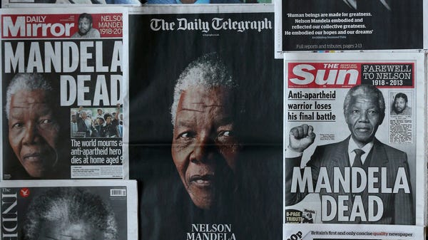 The front pages of British newspapers report on th