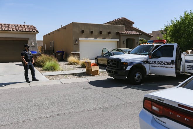 Las Cruces police investigate a home on Santa Sabina Avenue after a shooting at a house party injured a teen in Las Cruces on Friday, July 10, 2020.