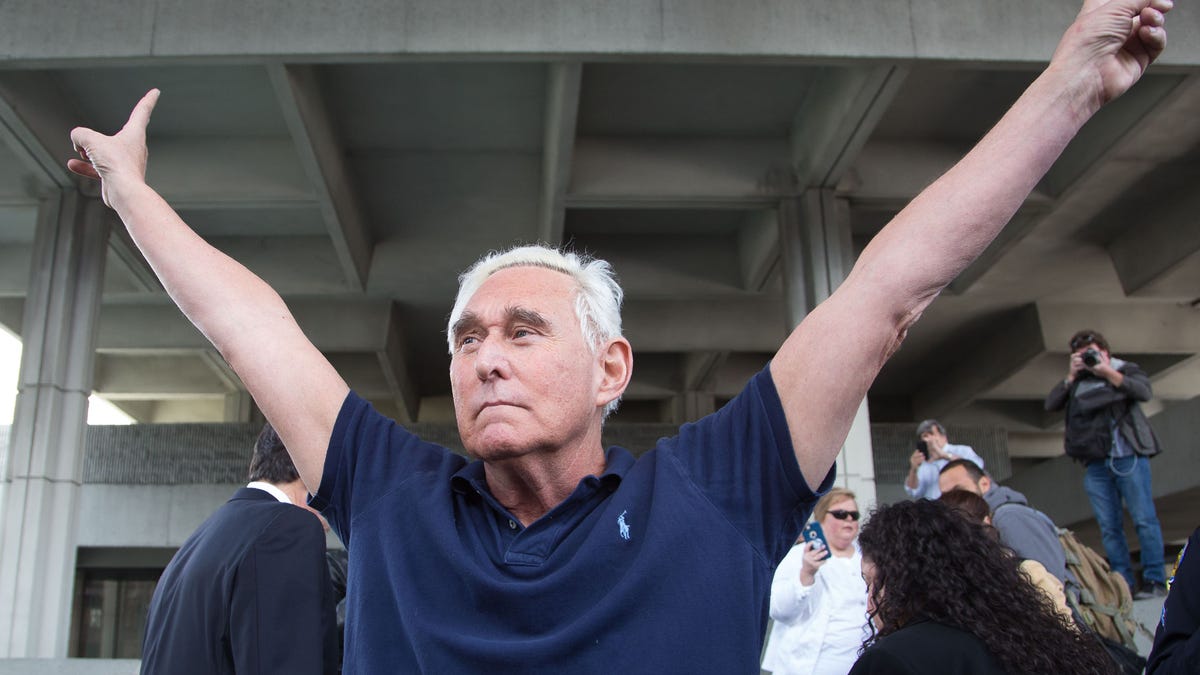 (FILES) In this file photo taken on January 25, 2019 Roger Stone, a longtime adviser to US President Donald Trump, throws up peace signs outside court in Fort Lauderdale, Florida. - US President Donald Trump communted the 40-month prison sentence of longtime ally Roger Stone on July 10, 2020, the White House said. (Photo by Joshua Prezant / AFP) (Photo by JOSHUA PREZANT/AFP via Getty Images) ORIG FILE ID: AFP_1UZ42F