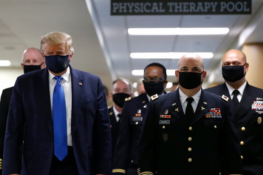 President Donald Trump wears a face mask during a visit to Walter Reed National Military Medical Center in Bethesda, Md., on July 11.