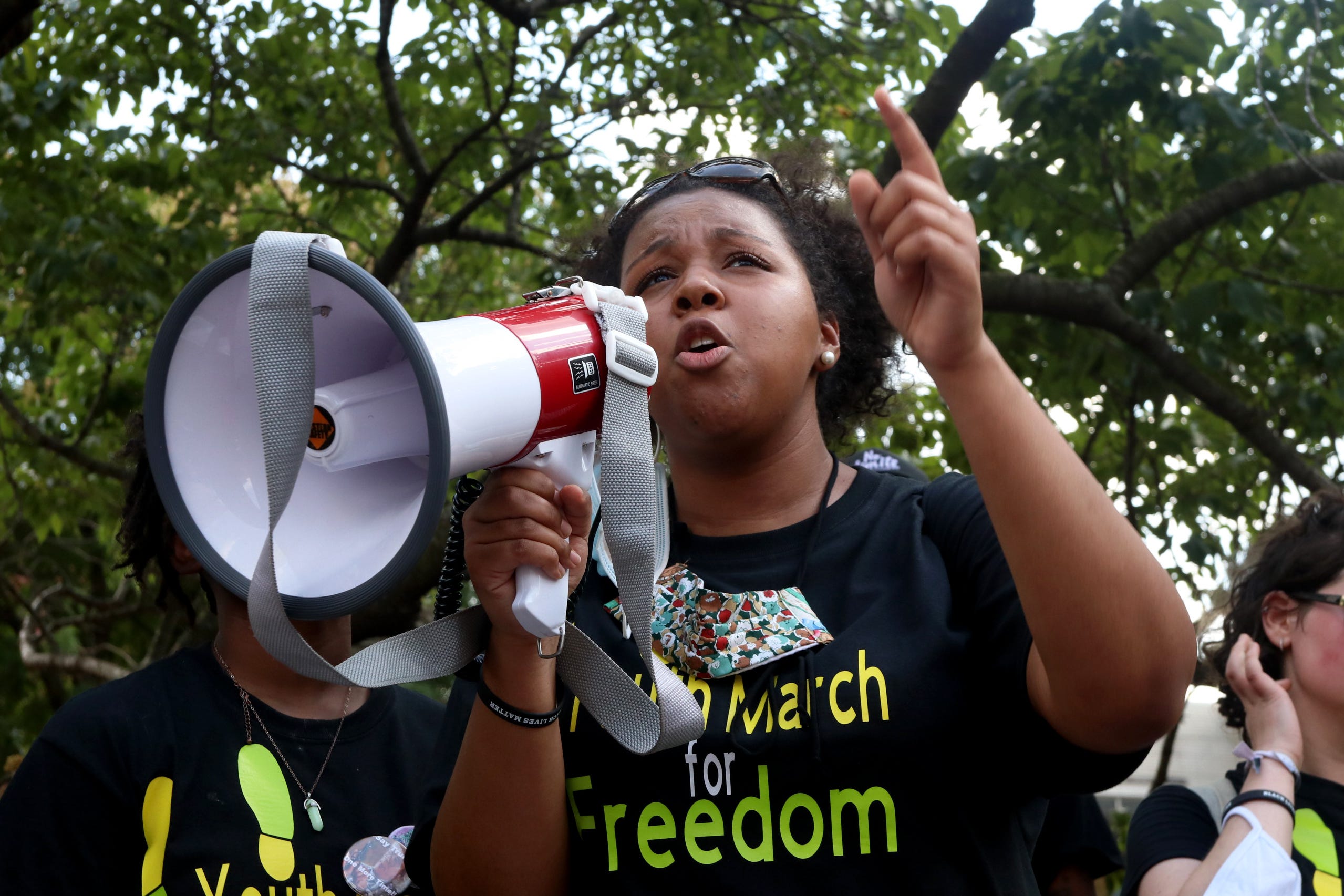 Imani Smith, 19, speaks to the crowd at the end of the Youth March for Freedom on July 4, 2020 in Louisville, Ky.