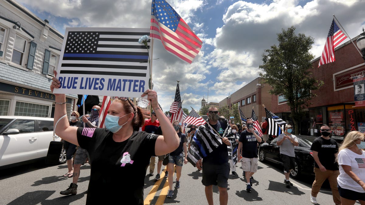 Stacey Gavin of Garnerville was among the approximately one-thousand people that took part in a rally and march in support of police in Suffern, N.Y. July 12, 2020. The rally started with speakers and a moment of silence at the Washington Avenue Soldier's Monument and Triangle, followed by a march throughout downtown Suffern on Lafayette Avenue, also known as Route 59.