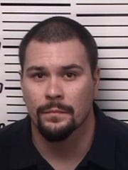 Manuelito Delarosa of Artesia remains jailed after law enforcement allegedly discovered marijuana, cash and a firearm during a search operation on July 10.2020.