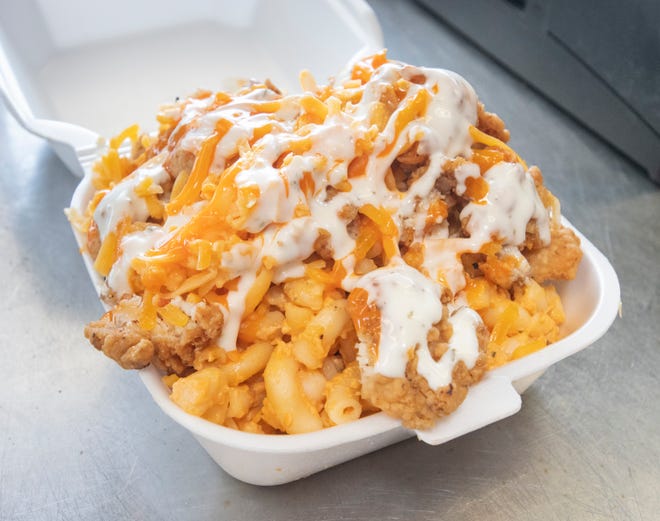An order of buffalo chicken mac is ready to eat in July at the new Melt food truck in Pensacola.