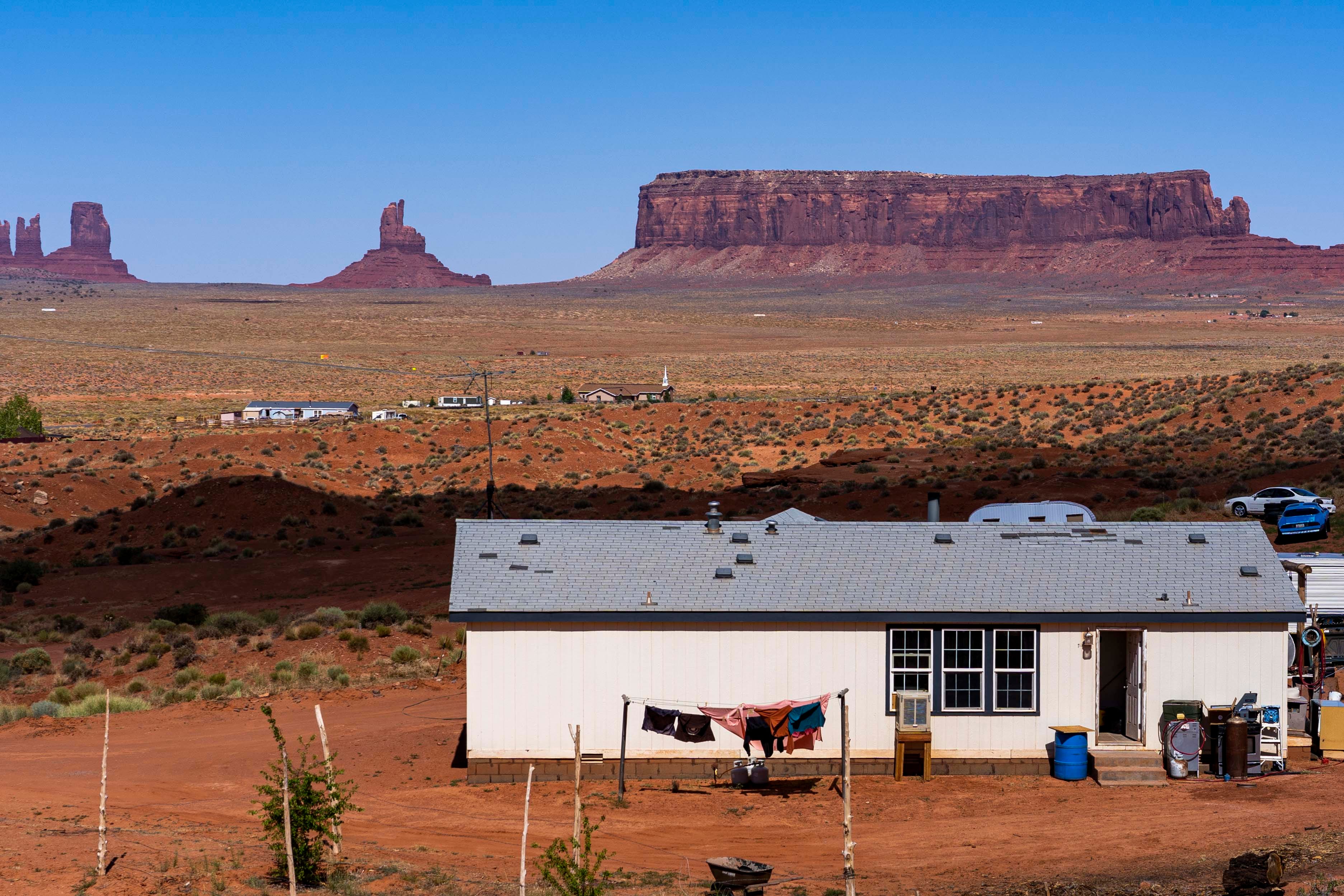 Residents dry their clothes outside a home in Monument Valley, Utah. An estimated 30% percent of people across the Navajo Nation live in homes without running water.