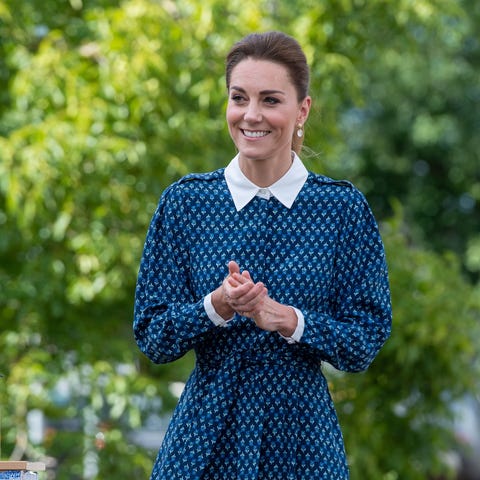 Duchess Kate of Cambridge applies hand sanitizer d