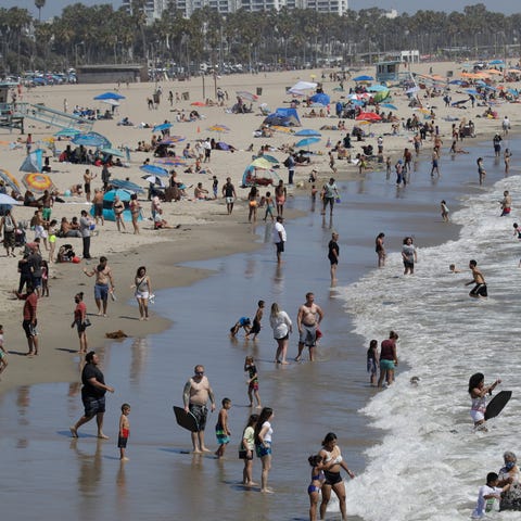 A heat wave has brought crowds to California's bea