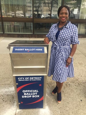 Wayne County Commissioner Monique Baker McCormick (D-Detroit) stands near a drop box for absentee ballots at the City Clerk’s Office in Detroit. She expects 60 drop boxes to be placed in libraries, firehouses and community centers throughout Wayne County ahead of the Nov. 3 general election.