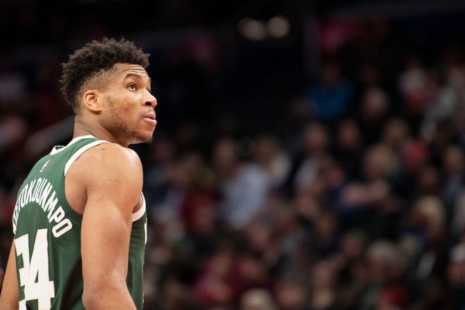 Feb 24, 2020; Washington, District of Columbia, USA;  Milwaukee Bucks forward Giannis Antetokounmpo (34) stands on the court during the first half against the Washington Wizards at Capital One Arena. Mandatory Credit: Tommy Gilligan-USA TODAY Sports