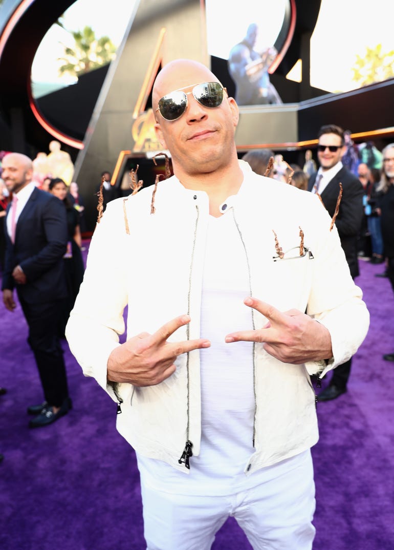 The shades are on, and the peace signs are out! Vin Diesel attends the Los Angeles premiere of Marvel's "Avengers: Infinity War" in 2018.