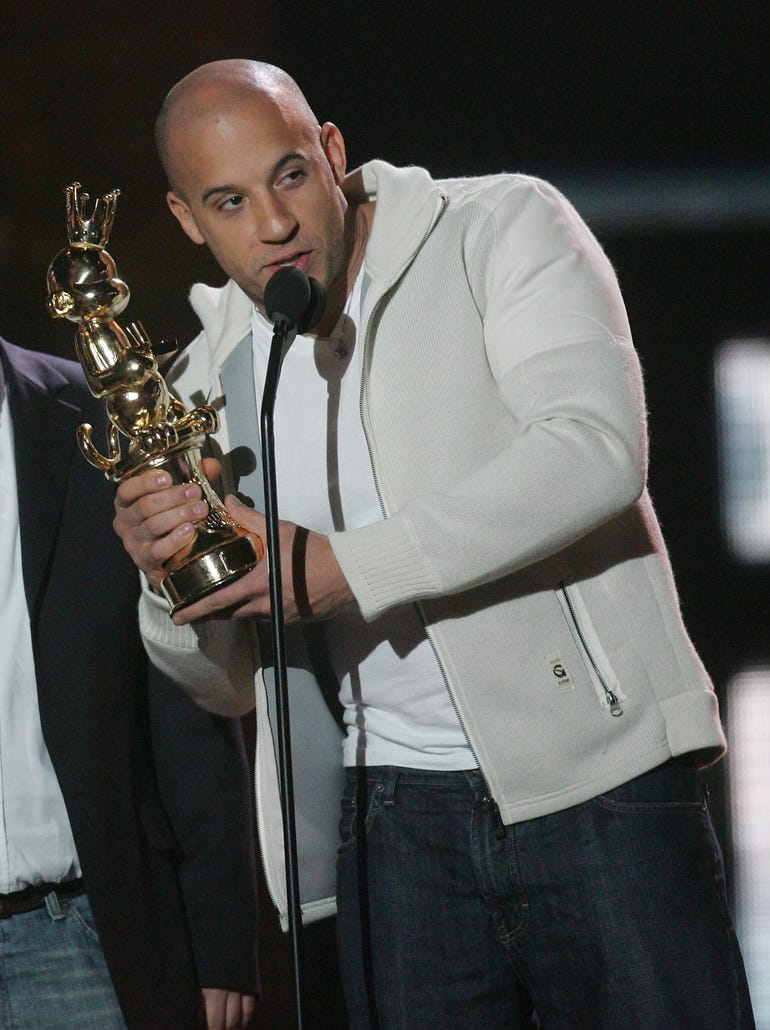 He accepts the Best Game Based on a Movie award for "The Chronicles of Riddick Escape from Butcher Bay" at the Spike TV's Video Game Awards in 2004.