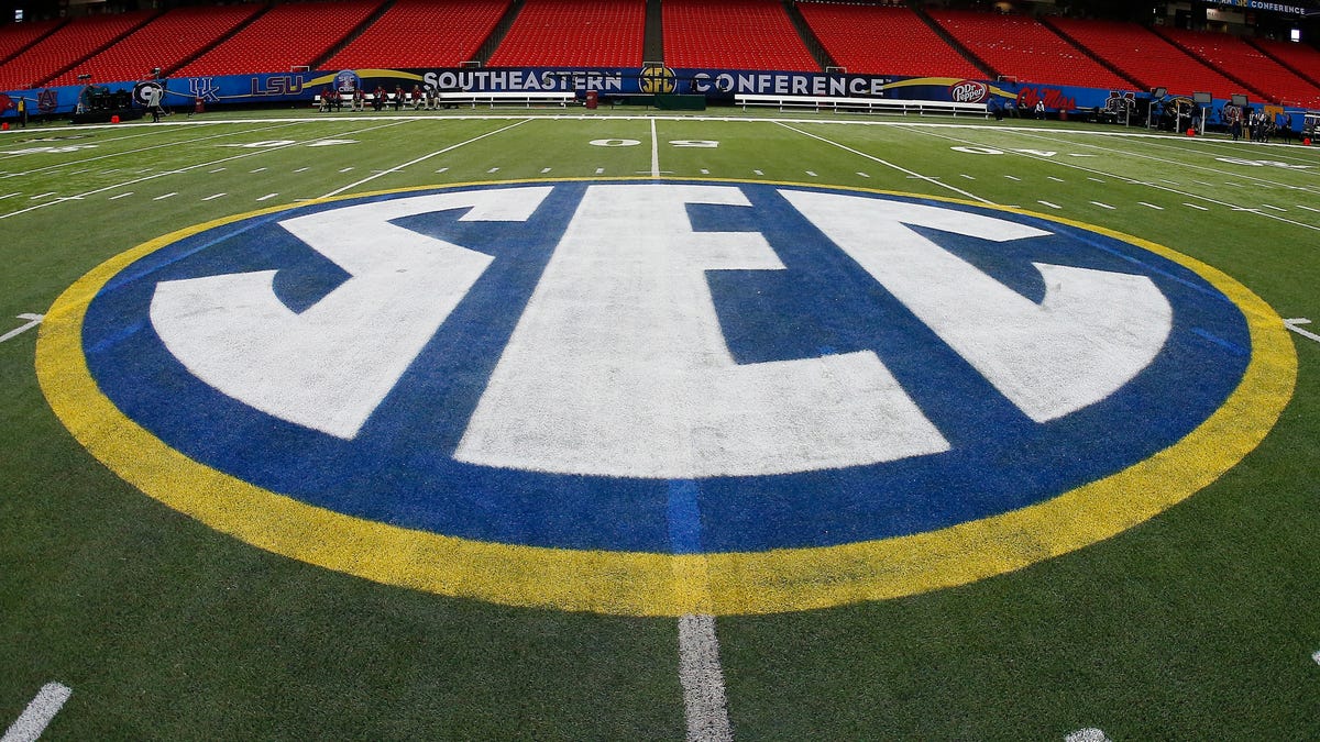 SEC logo is displayed on the field ahead of the Southeastern Conference championship game.