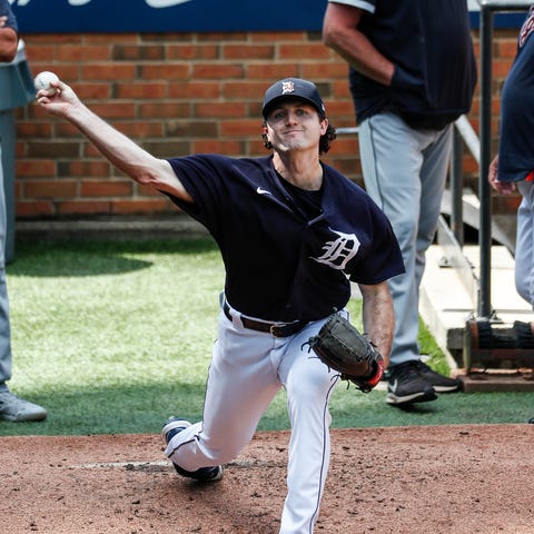 Detroit Tigers pitcher Casey Mize warms up in the 
