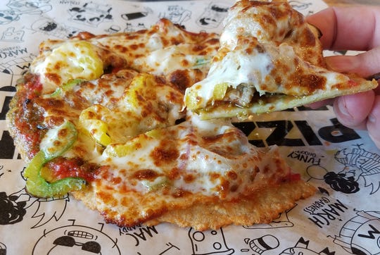 Azzip Pizza is trialing a zero-carb pizza crust made out of chicken at the East Side Restaurant at 2121 N. Green River Road.