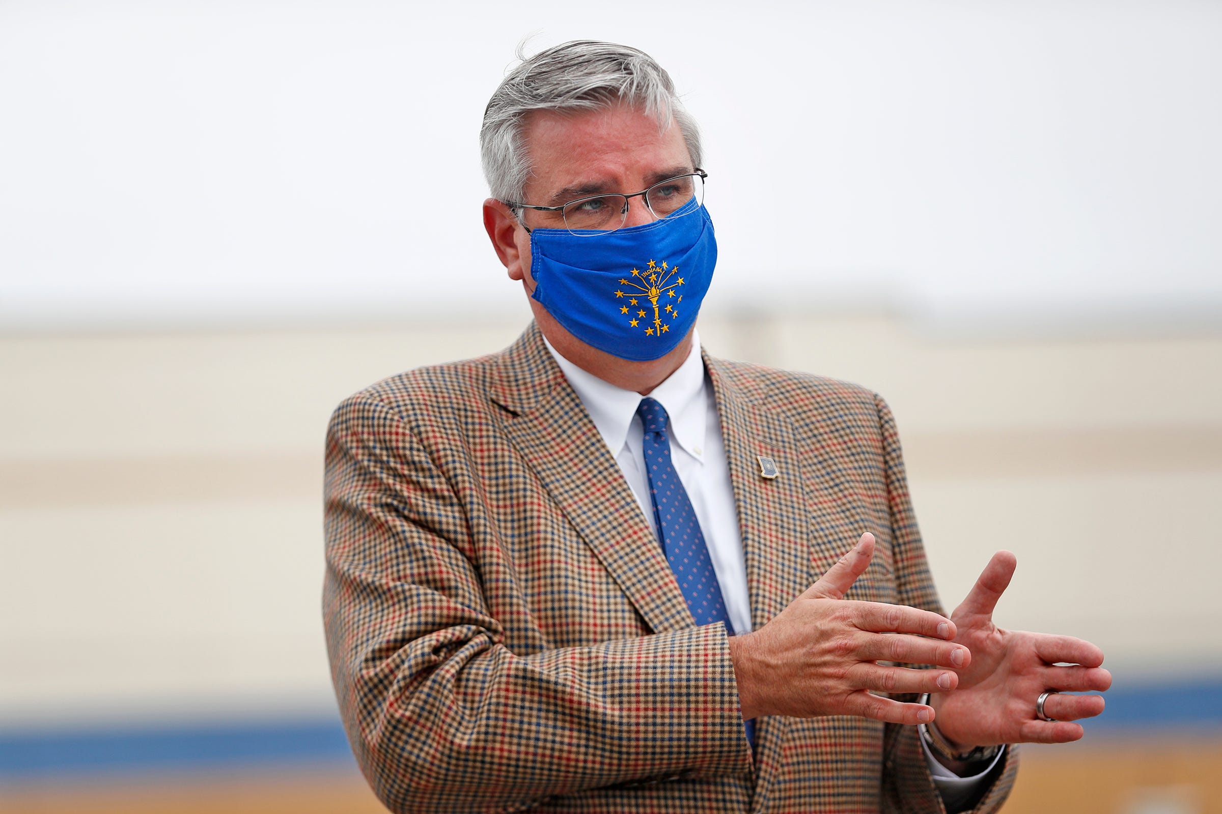 Governor Eric Holcomb answers questions for the media after the MonoSol Lebanon Facility ribbon cutting, Thursday, July 16, 2020.