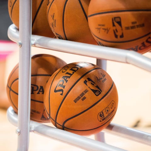 General view of basketballs on a rack before an NB