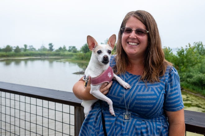 Lisa Beedon poses for a portrait with her dog Rosey, an 8-year-old Rat Terrier Thursday, July 17, 2020, in Port Huron. The Port Huron city councilwoman is running as the Democratic candidate to replace Howard Heidemann on the county board.