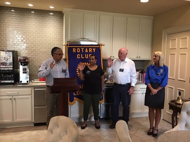 Past President Mike Deville (Left) conducts the installation of club officers for the 2020-2021 year. From left: club secretary Monique Belvin; president-elect, Charles Elliott; and president, Kimberly Jones. Justin Lemmons was elected treasurer.