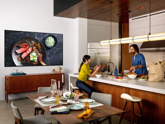 The Samsung 98 Inch 8K UHD QLED HDR Smart TV has built-in Wi-Fi and Ethernet connectivity, four HDMI inputs, and three USB ports.