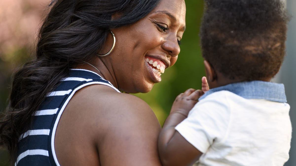 Iaishia Smith with her 11 month old son Marquis Jr. outside their home in Avenel, NJ on Tuesday July 21, 2020. Smith shares the story of her first pregnancy where she worried about some complications during her last trimester. A week after Smith's doctor assured her everything was fine, her daughter passed away, just 11 days before her due date. "It was the worst day of my life," Smith said. Now mother to a healthy 11 month old boy Smith wants to share her story so other mother's can advocate for themselves and their family. 