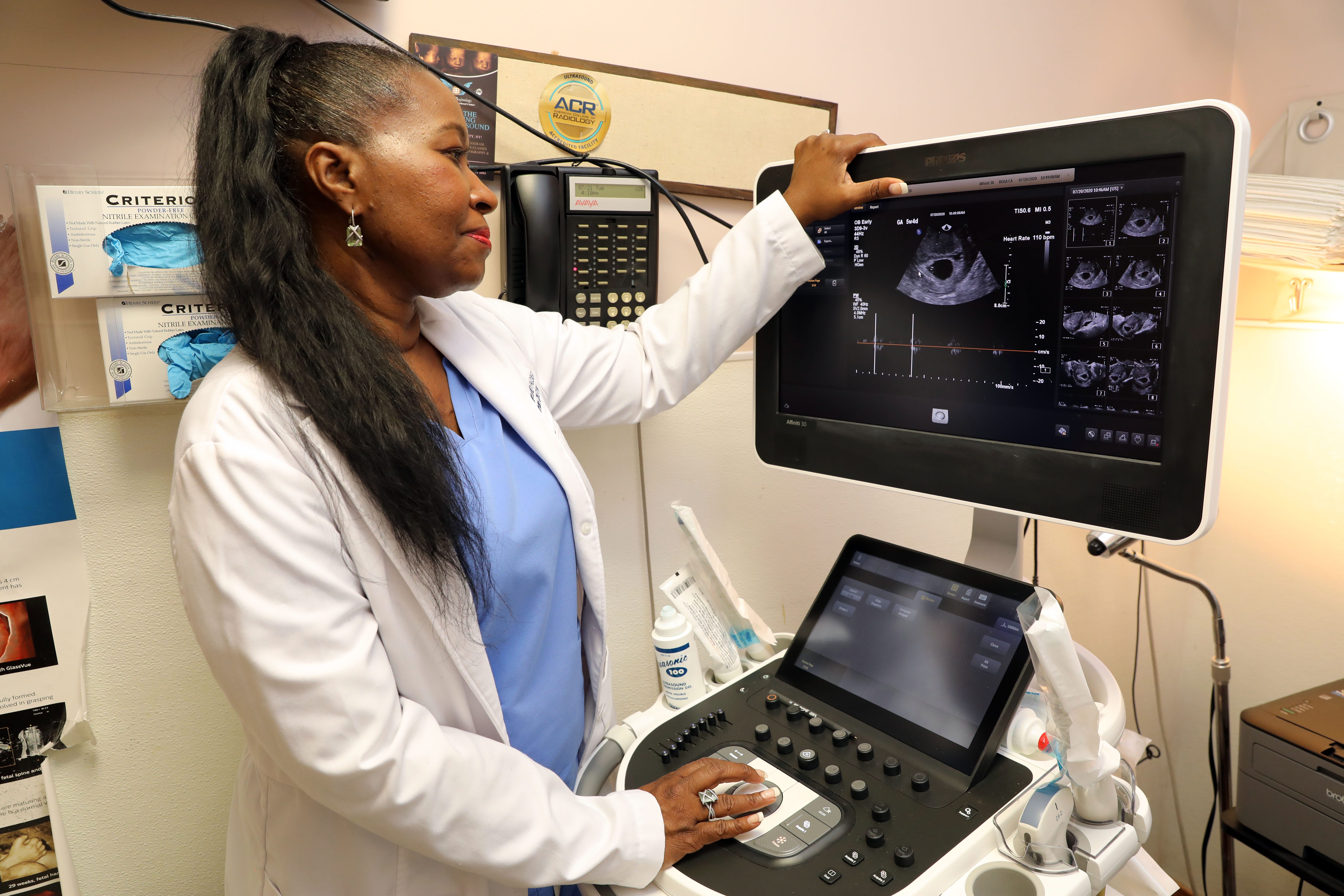 Dr. Suzanne Greenidge reviews a sonogram at Woman to Woman OBGYN, her private practice in Yonkers July 21, 2020. Dr. Greenidge is affiliated with St. John's Riverside Hospital al in Yonkers.