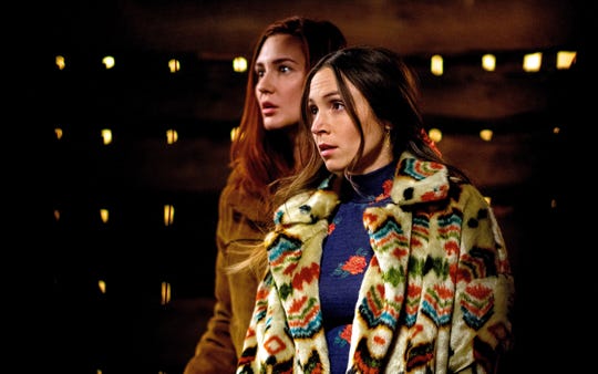 Katherine Barrell as Officer Nicole Haught and Dominique Provost-Chalkley as Waverly Earp in Season 4 of "Wynonna Earp."