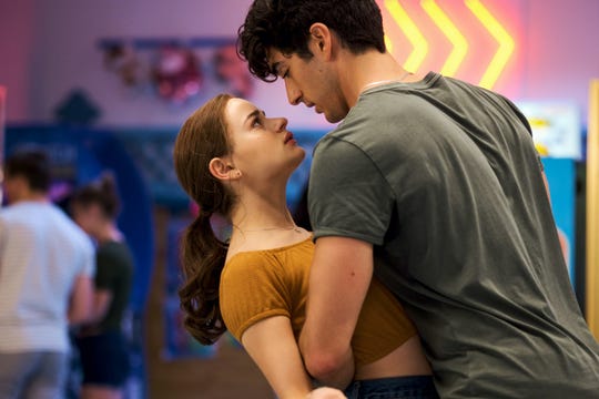 In "Kissing Booth 2," Elle (Joey King) meets new classmate Marco (Taylor Zakhar Perez) while her boyfriend is at college. King, Zakhar Perez and the rest of the main cast are returning in 2021 for "Kissing Booth 3."