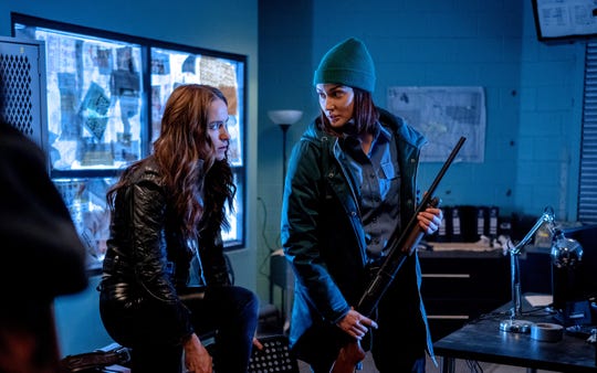 Melanie Scrofano as Wynonna Earp, (left) and Katherine Barrell as Officer Nicole Haught suit up for the highly anticipated fourth season.