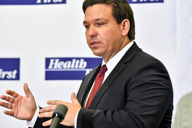 Florida Gov. Ron DeSantis addresses the media during a coronavirus news conference at Health First's Holmes Regional Medical Center in Melbourne.
