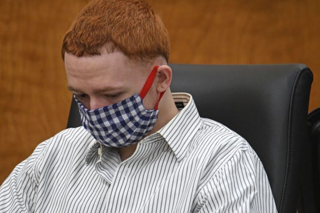 Roscoe Hunter bows his head as he listens to testimony during his murder and arson trial earlier this week.