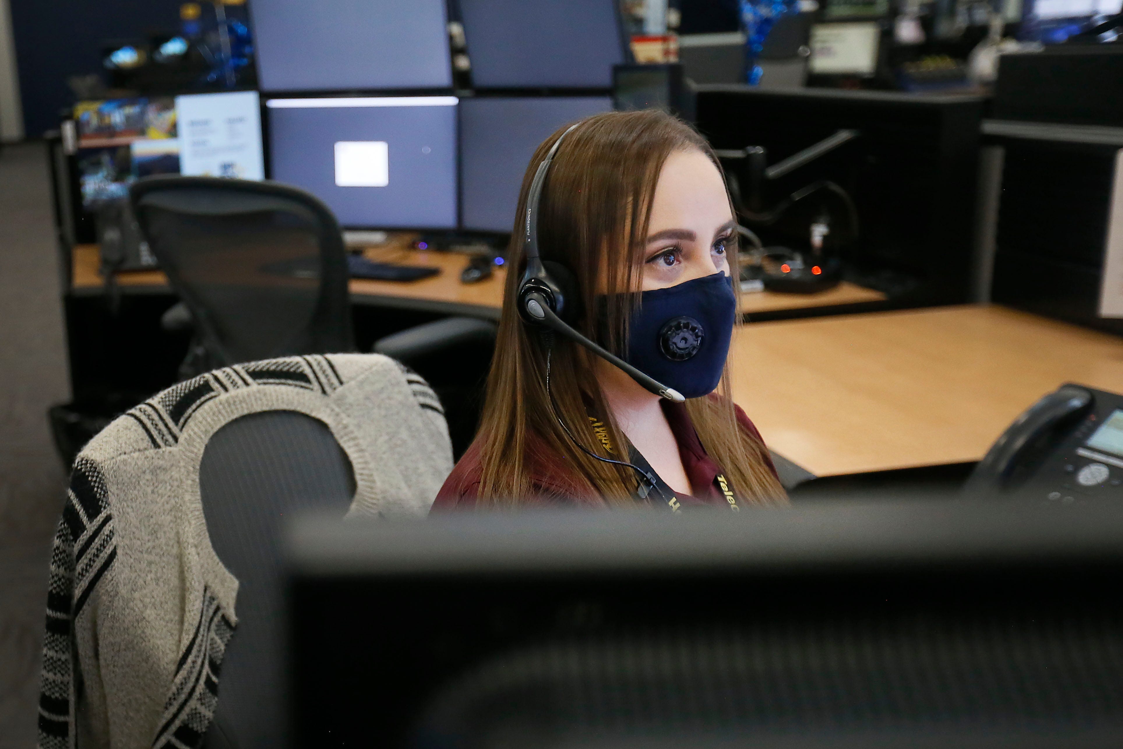 Public safety telecommunicator Bernardette Falcon works Thursday, July 23, at the Regional Communications Center in Northeast El Paso. Falcon was one of the first public safety telecommunicators to take 911 calls from people at Walmart on Aug. 3, 2019.  A woman who stayed on the line with Falcon was able to give a description of the shooter.