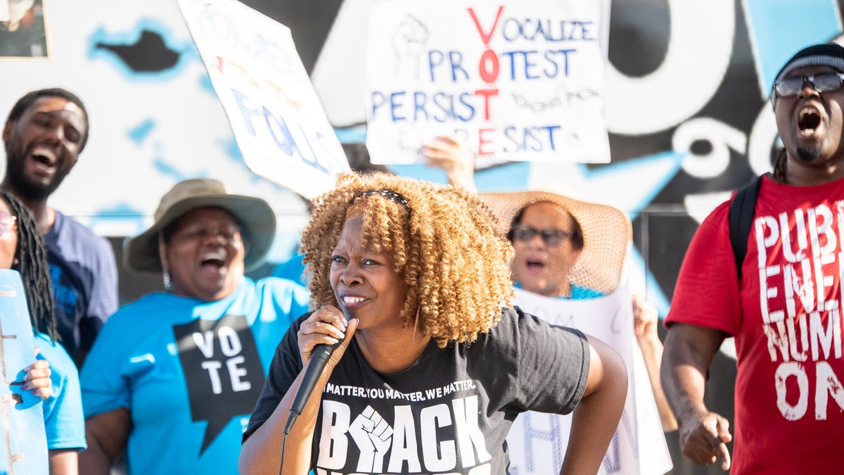 Georgia voting rights activist LaTosha Brown speaks to a group of supporters. Brown is the co-founder of Black Voters Matter, a non-profit aimed at helping Black and other voters of color navigate often complex voting regulations that many activists feel are aimed at suppressing the vote.