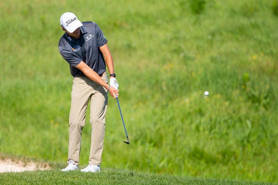 Richy Werenski chips on the 18th hole during the first round of the 3M Open.