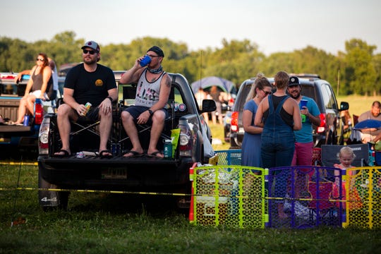RAGBRAI riders and attendees listen to The Pork Tornadoes play a drive-in concert on July 24, 2020 at Water Works Park. The show was the second-to-last day of 2020's socially-distanced 'Virtual RAGBRAI.' 