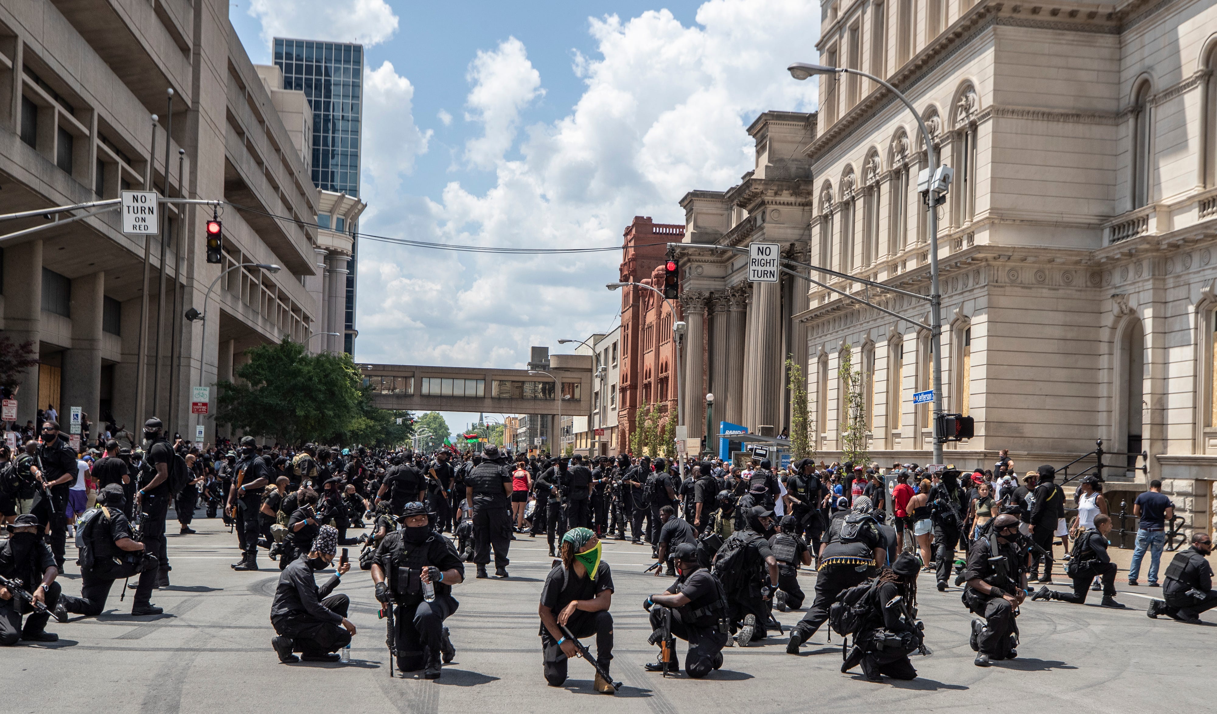 In July 2020, the Not F***ing Around Coalition came to Louisville, Ky., in support of racial justice while the Three Percenters also was in town. Louisville police kept the two groups apart with barricades. The coalition paused to check for snipers.