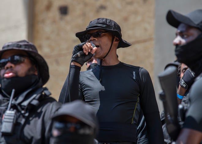 Grandmaster Jay of the Not F***ing Around Coalition came to Louisville in support of racial justice while the Three Percenters militia also was in town. Louisville police kept the two groups apart with barricades. July 25, 2020.