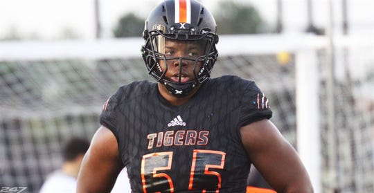 Belleville's Damon Payne is heading to Alabama.
