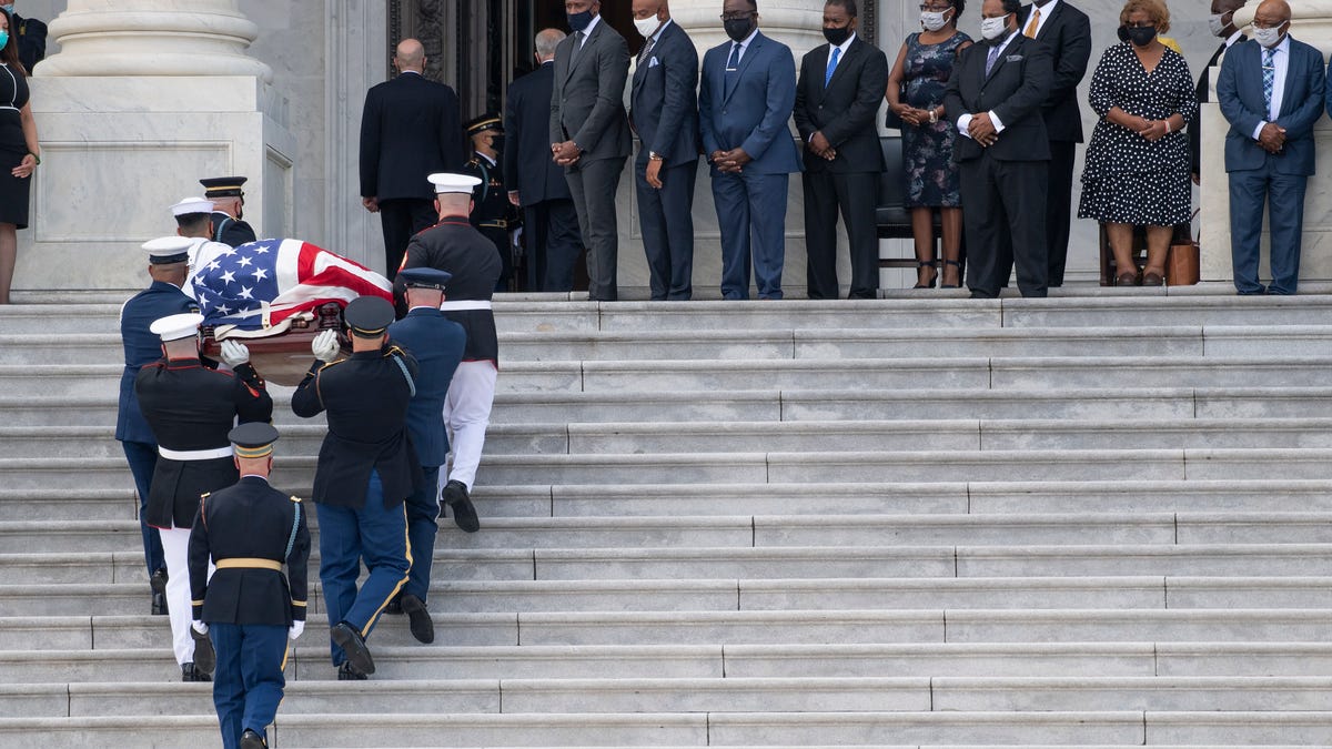 The casket of Rep. John Lewis carried by military honor guard up the steps of the U.S. Capitol on July 27, 2020 in Washington. Lewis, the civil rights icon whose fight for racial justice began in the Jim Crow south and ended in the halls of Congress, died on July 17, 2020.