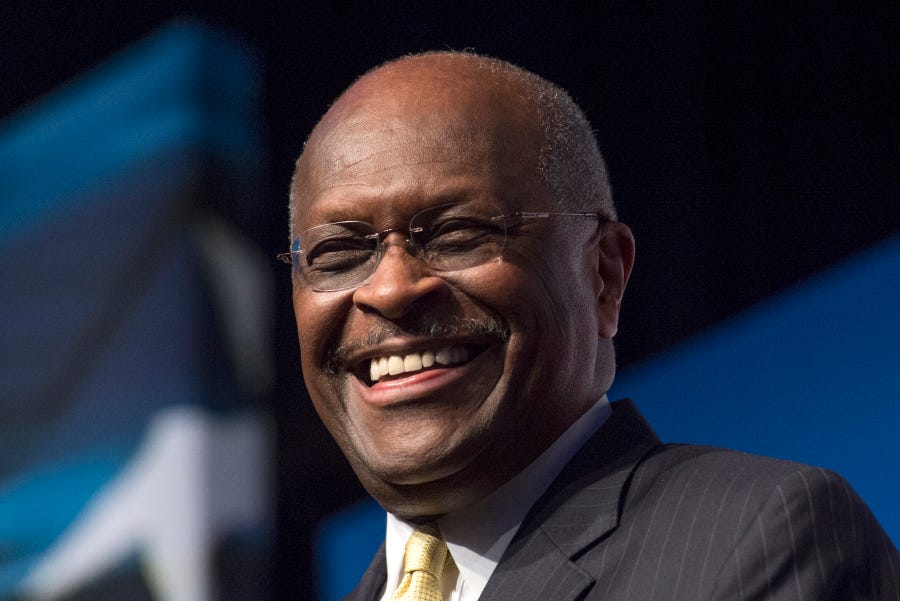 Herman Cain, CEO, The New Voice, speaks during Faith and Freedom Coalition's Road to Majority event in Washington on June 20, 2014.  Former Republican presidential candidate Herman Cain died after a battle with COVID-19, according to posts on his Twitter account and on his website.