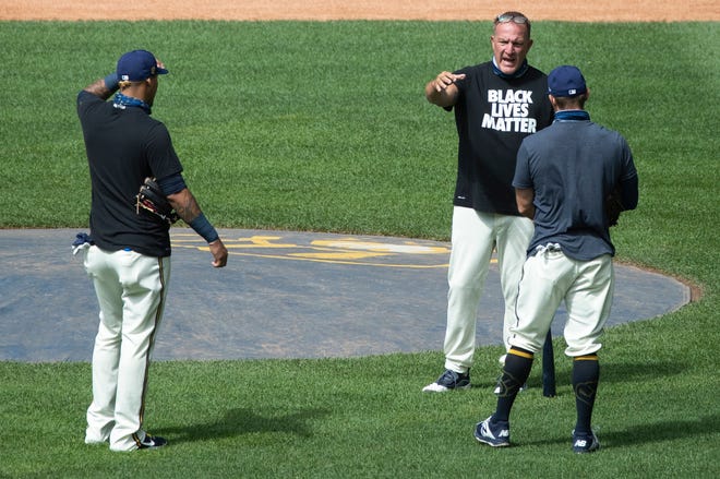 Milwaukee Brewers bench coach Pat Murphy directs practice July 31 at Miller Park.
