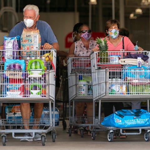 Shoppers head stock up on groceries to prepare for