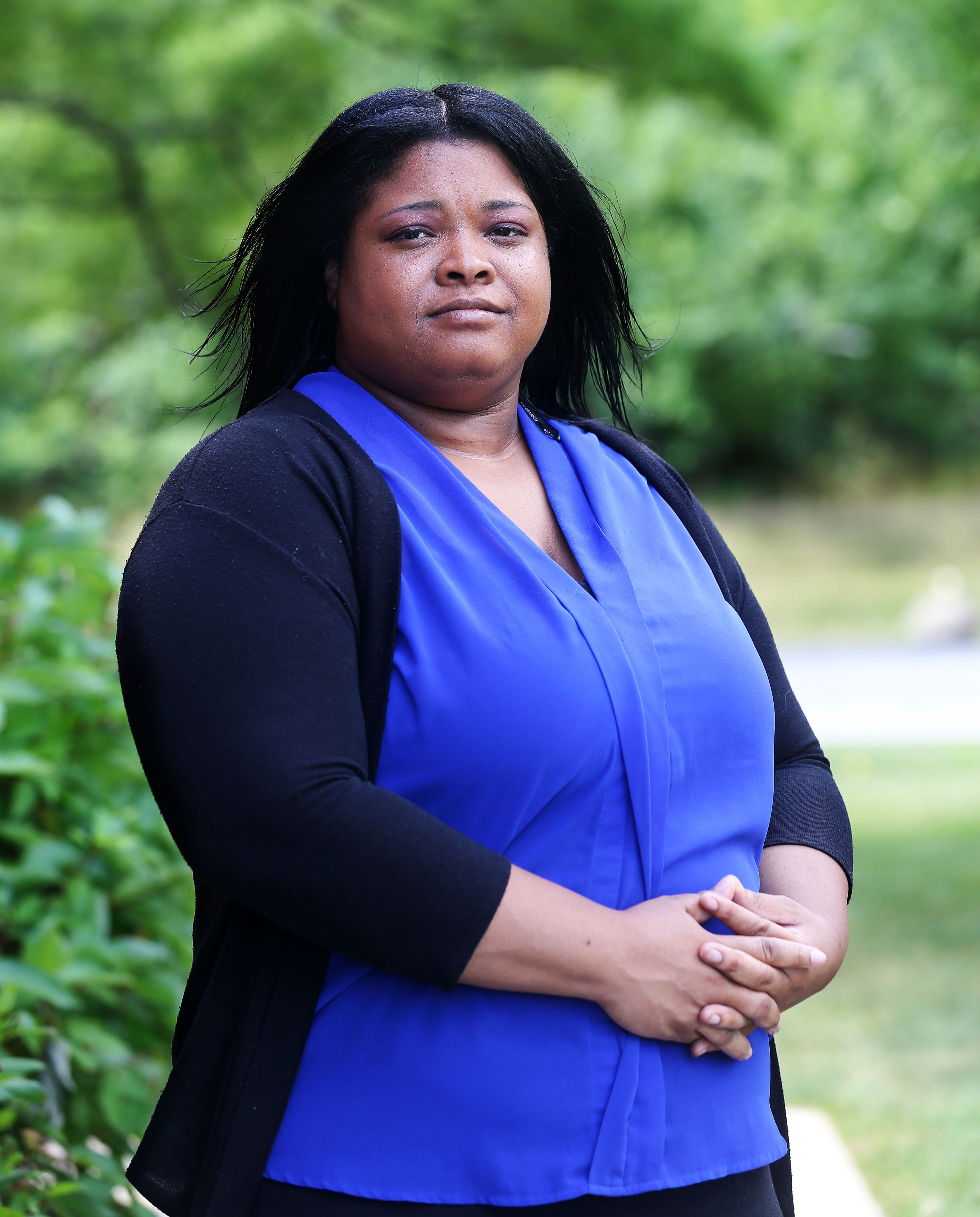 Raylene Jones from Milwaukee is photographed on Friday, July 31, 2020. Jones contracted COVID-19 and spent the next 15 days in the hospital. Now, she's suffering from fatigue, a lingering cough and body aches, as well as PTSD from the illness. She has not been able to return to her work in the finance industry. Patients like Jones have recovered from COVID-19 but are battling long-lasting symptoms.