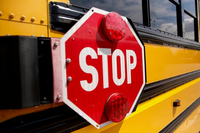 School buses sit parked, Monday, Aug. 3, 2020 in Lafayette.