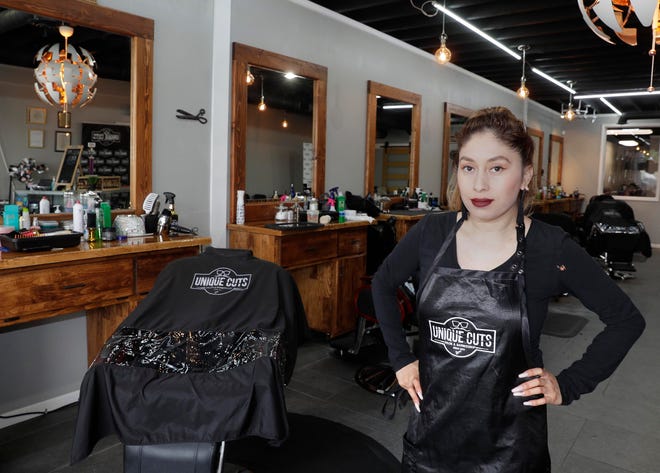 Marta J. Chavez, owner of Unique Cuts on South 27th Street, is trying to keep her business afloat in one location. "The pandemic hit me when I had both businesses," Chavez said. "Now I only have one because I saw that things were going to be critical." She hopes to build the business back soon.