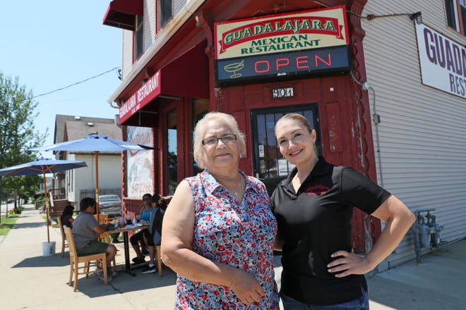 Genoveva Lozada, left, and her husband, Felipe, own Guadalajara Mexican restaurant at 901 S. 10th St. in Milwaukee. Her daughter, Fabiola Estrada, right, helps manage the business. At first, they remained open only for carry-out orders. Now they are trying to navigate the economic fallout from the pandemic as they operate on reduced hours.