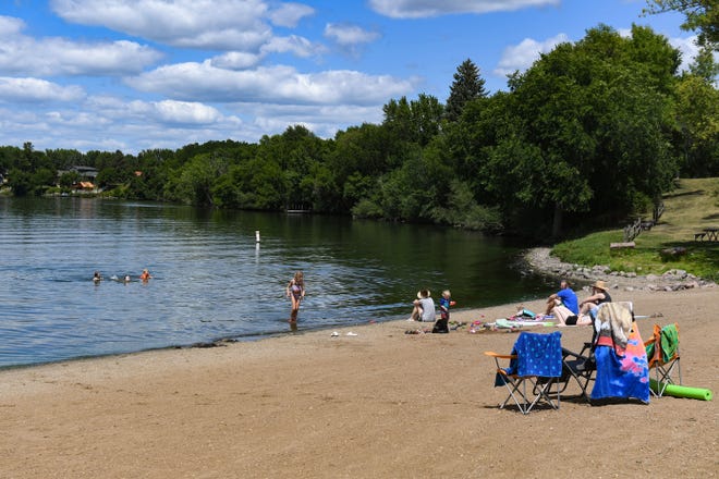 People visit Wall Lake Beach on Monday, August 3, in Sioux Falls.