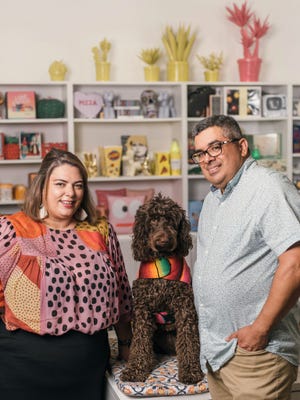 Ginger and Mario Diaz with their dog, Frida