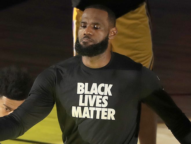 LeBron James wearing a "Black Lives Matter" shirt prior to an NBA game.